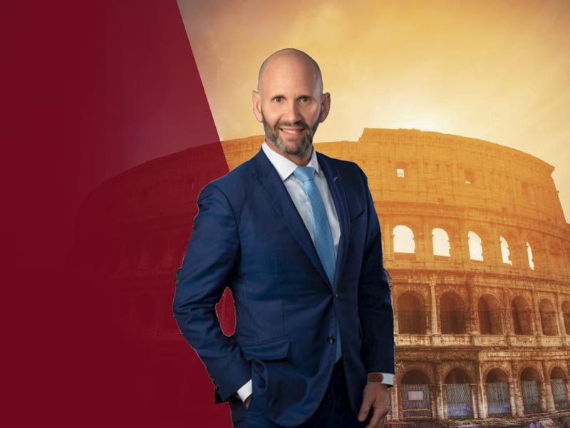 Mitchell a. greenburg infront of colosseum